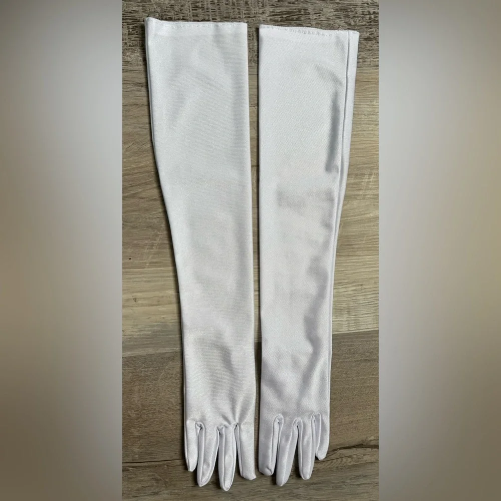 These long women's gloves, 20 inches in length, are made of stretchy satin